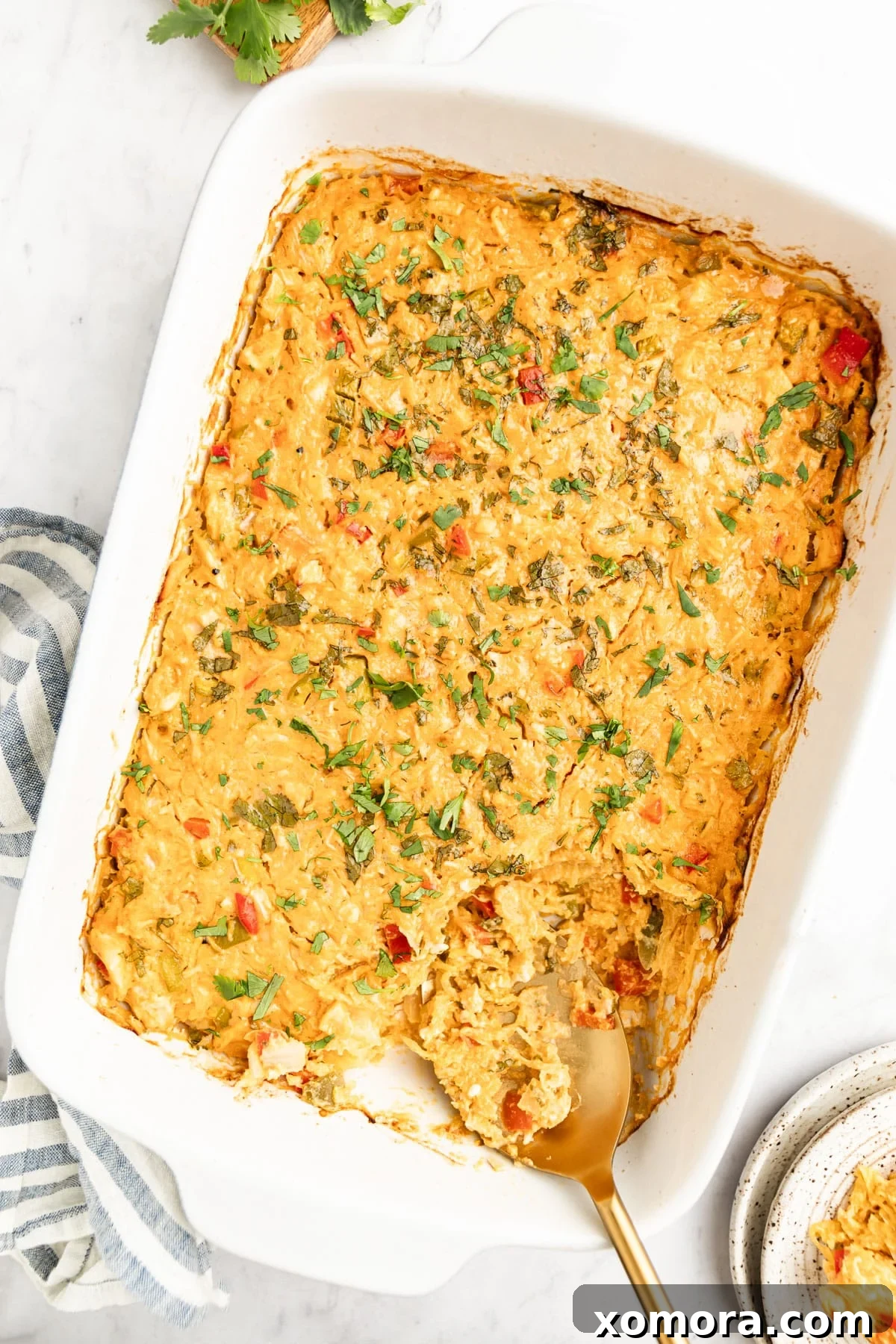 Hearty Buffalo Ranch Chicken Casserole in a baking dish, ready to be served.