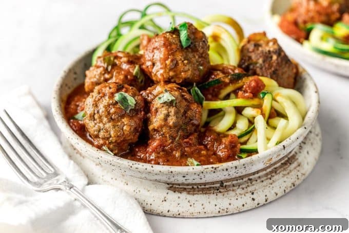 Slow-Simmered Marinara Meatballs 3 A close-up of a skillet filled with browned meatballs before adding the marinara sauce.