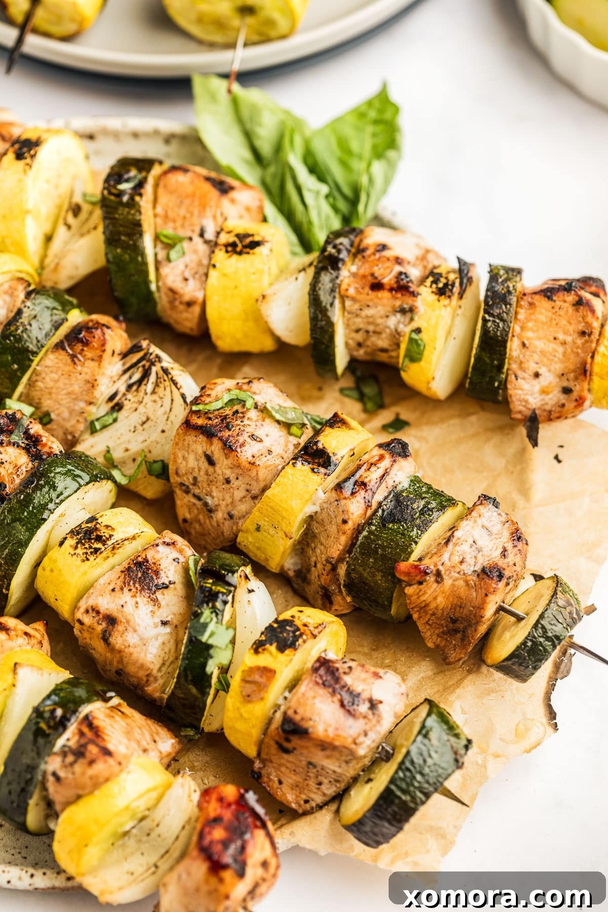 Balsamic Garlic Glazed Chicken Skewers 2 Grilled Garlic Balsamic Chicken Kabobs on a platter