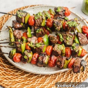 Pesto Steak Kabobs with blistered tomatoes and bell peppers