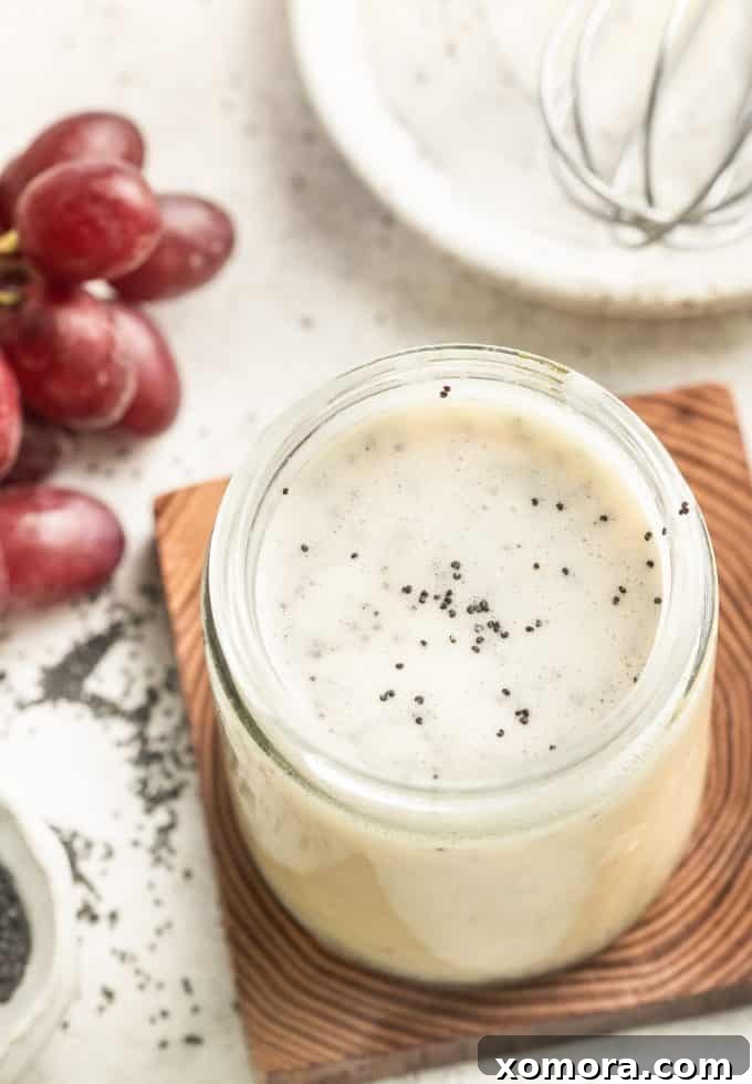 Zesty Lemon Poppy Seed Dressing 5 Four small glass jars of different homemade salad dressings, including the Lemon Poppy Seed Dressing.