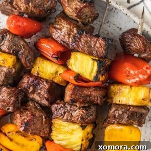 Aloha Grilled Steak Kabobs 6 Hawaiian Steak Kabobs with grilled steak, pineapple, and sweet mini peppers.
