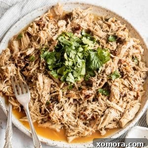 Fork-Tender Slow Cooker Italian Shredded Chicken 6 Slow Cooker Italian Shredded Chicken ready for serving.