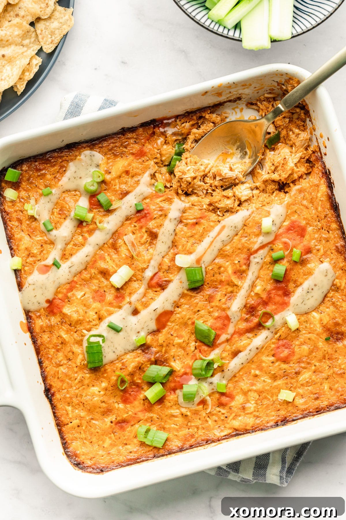 Kickin Dairy Free Buffalo Ranch Chicken Dip 4 A bowl of shredded cooked chicken, ready to be incorporated into the buffalo ranch dip recipe.