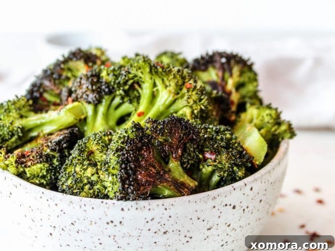 Fiery Roasted Broccoli 3 Close-up of roasted broccoli florets with red pepper flakes