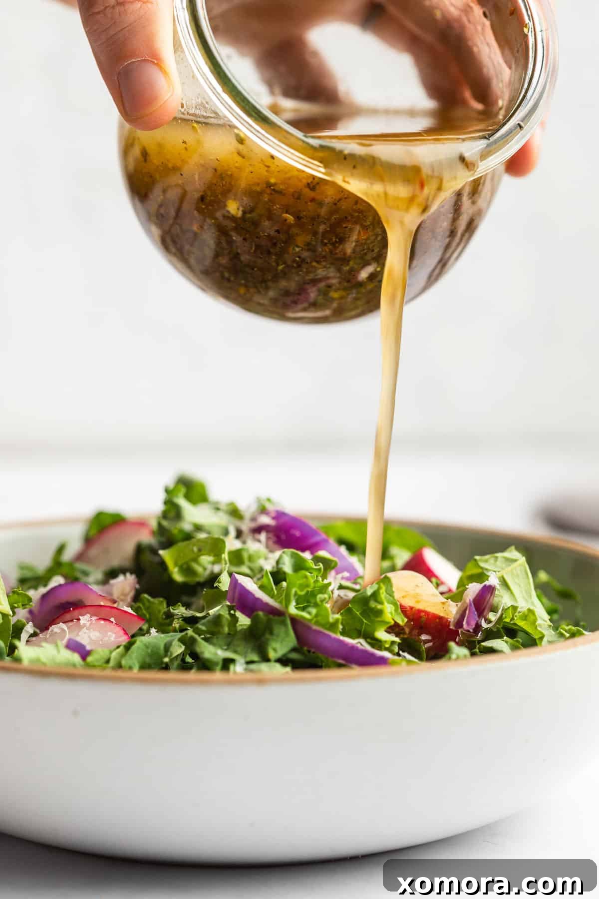 Ingredients for homemade Italian dressing laid out on a kitchen counter.