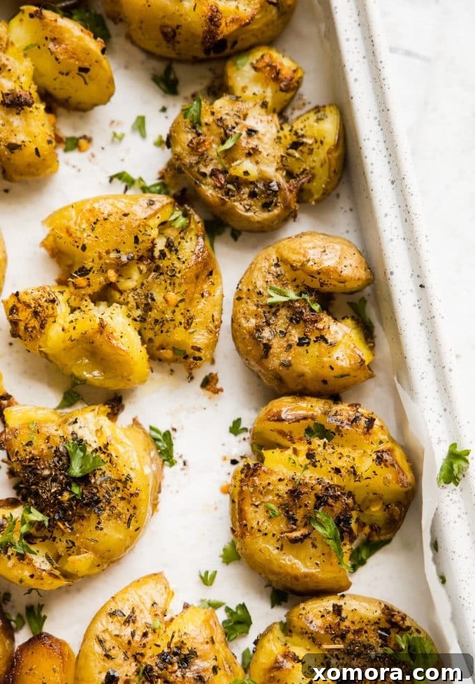 A serving of Smashed & Roasted Italian Potatoes ready to be enjoyed.