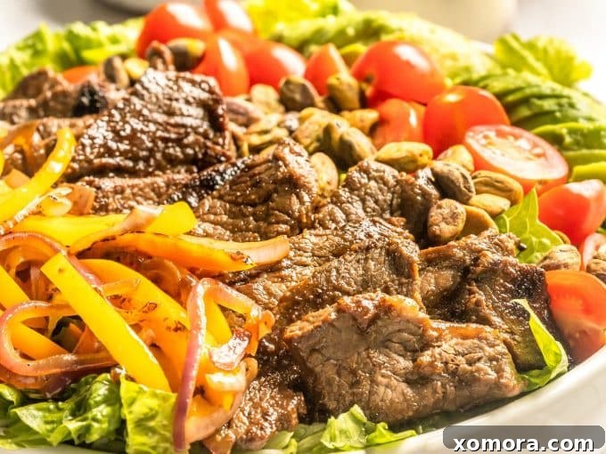 Fiesta Steak Salad with Citrus Vinaigrette 5 Perfectly sliced avocado fanned out on a cutting board, ready to be added to the Southwestern Steak Salad.
