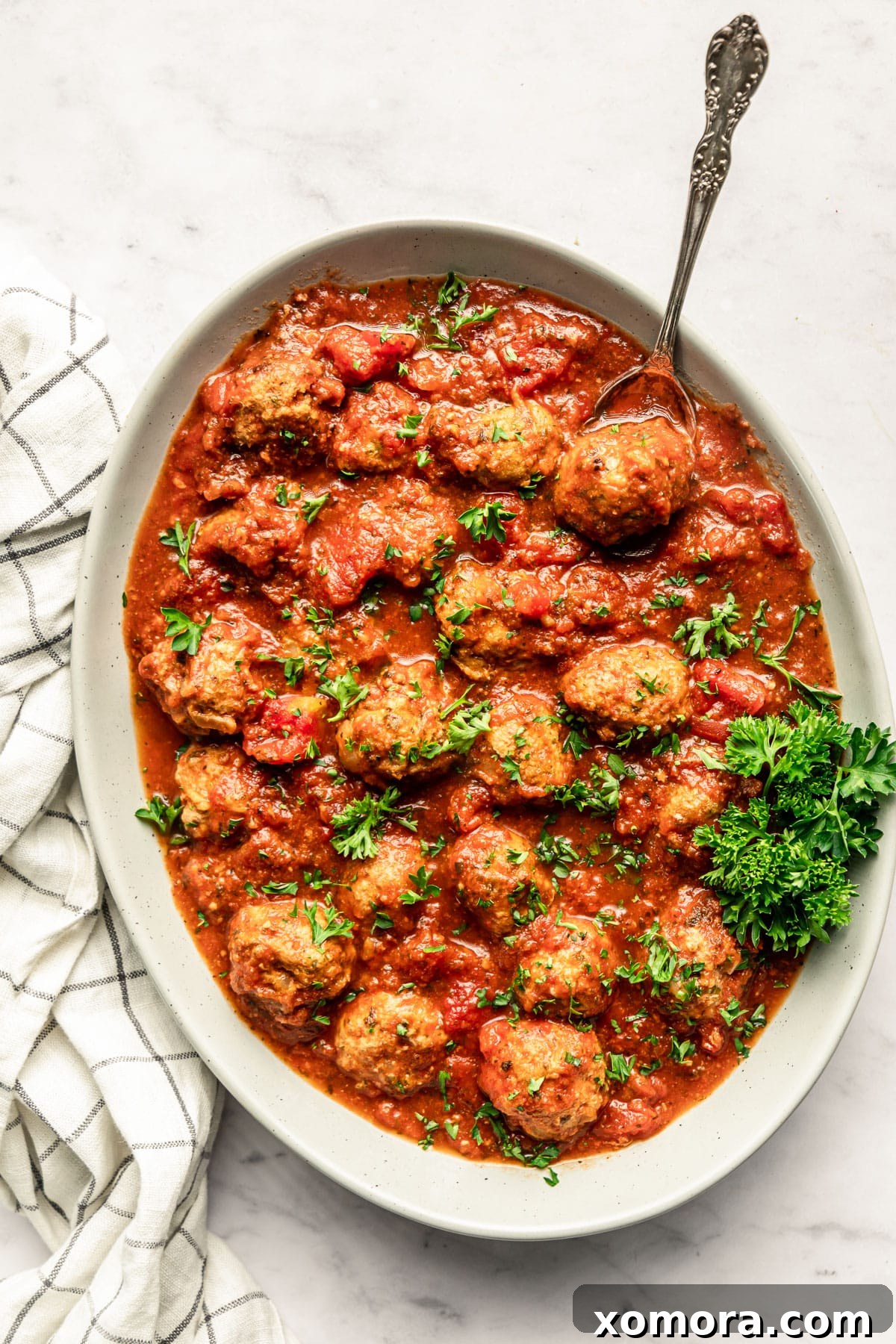 Mouthwatering Slow Cooker Turkey Meatballs in Classic Marinara 4 Slow cooker filled with turkey meatballs simmering in marinara sauce.