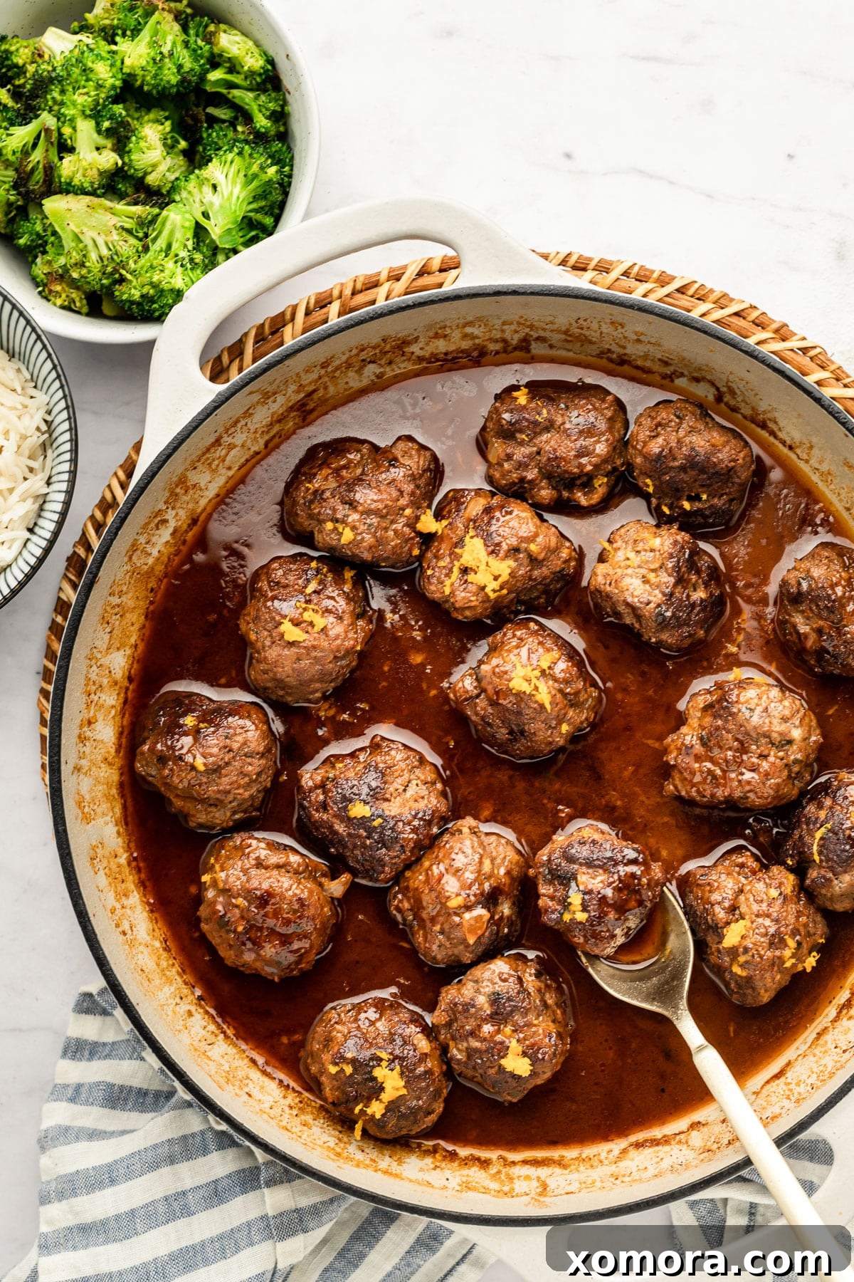 Zesty Orange Balsamic Glazed Meatballs 3 Close-up of a single Orange Balsamic Meatball, showing its glossy sauce and tender texture