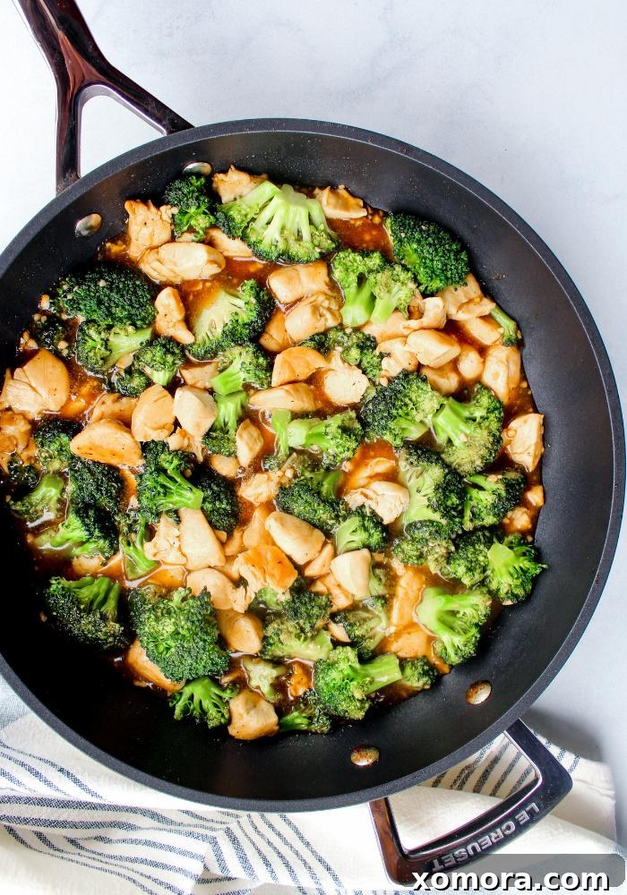Savory Teriyaki Chicken and Broccoli Stir-Fry 2 A beautifully plated dish of Teriyaki Chicken and Broccoli, showcasing golden-brown chicken chunks and bright green broccoli florets coated in a glossy sauce.