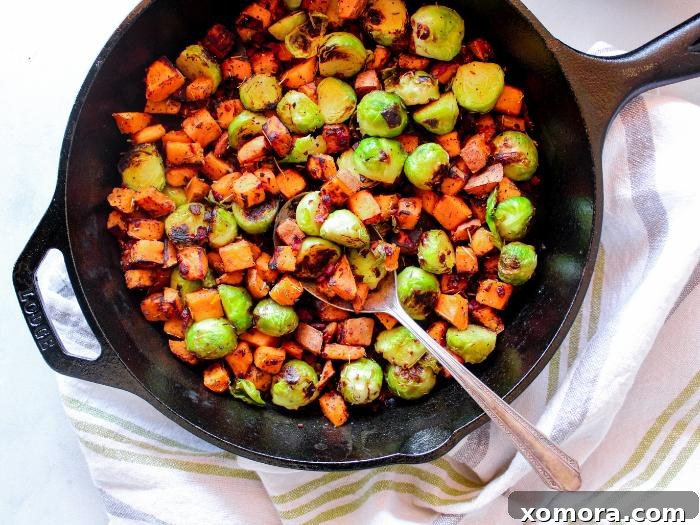 Smoky Bacon Sweet Potato Medley 4 Ingredients for Sweet Potato Bacon Hash prepped and ready for cooking, including diced sweet potatoes, bacon, and halved Brussels sprouts.