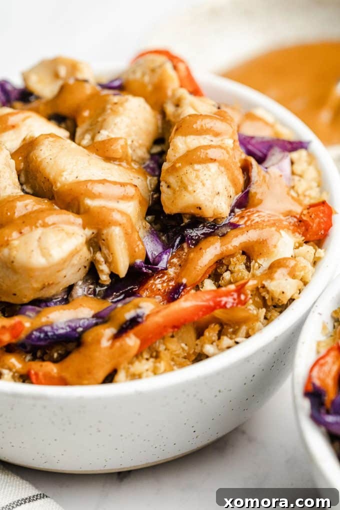 Peanut Satay Chicken Cauliflower Power Bowls 4 Fully assembled Chicken Satay Cauliflower Rice Bowl with chicken, roasted veggies, and almond satay sauce.