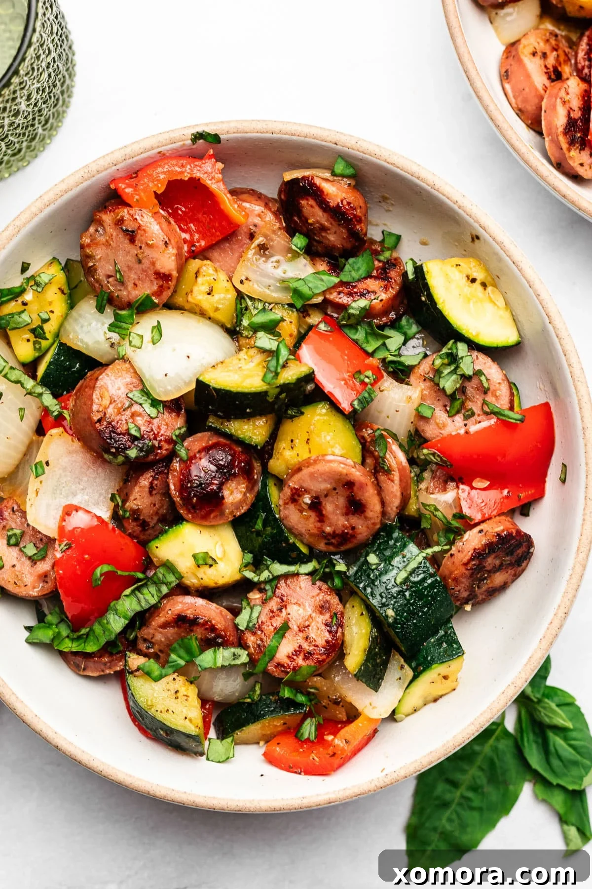 One-Pan 20-Minute Sausage and Zucchini Meal 6 A full skillet of the cooked sausage and zucchini, ready to be served, with vibrant colors.