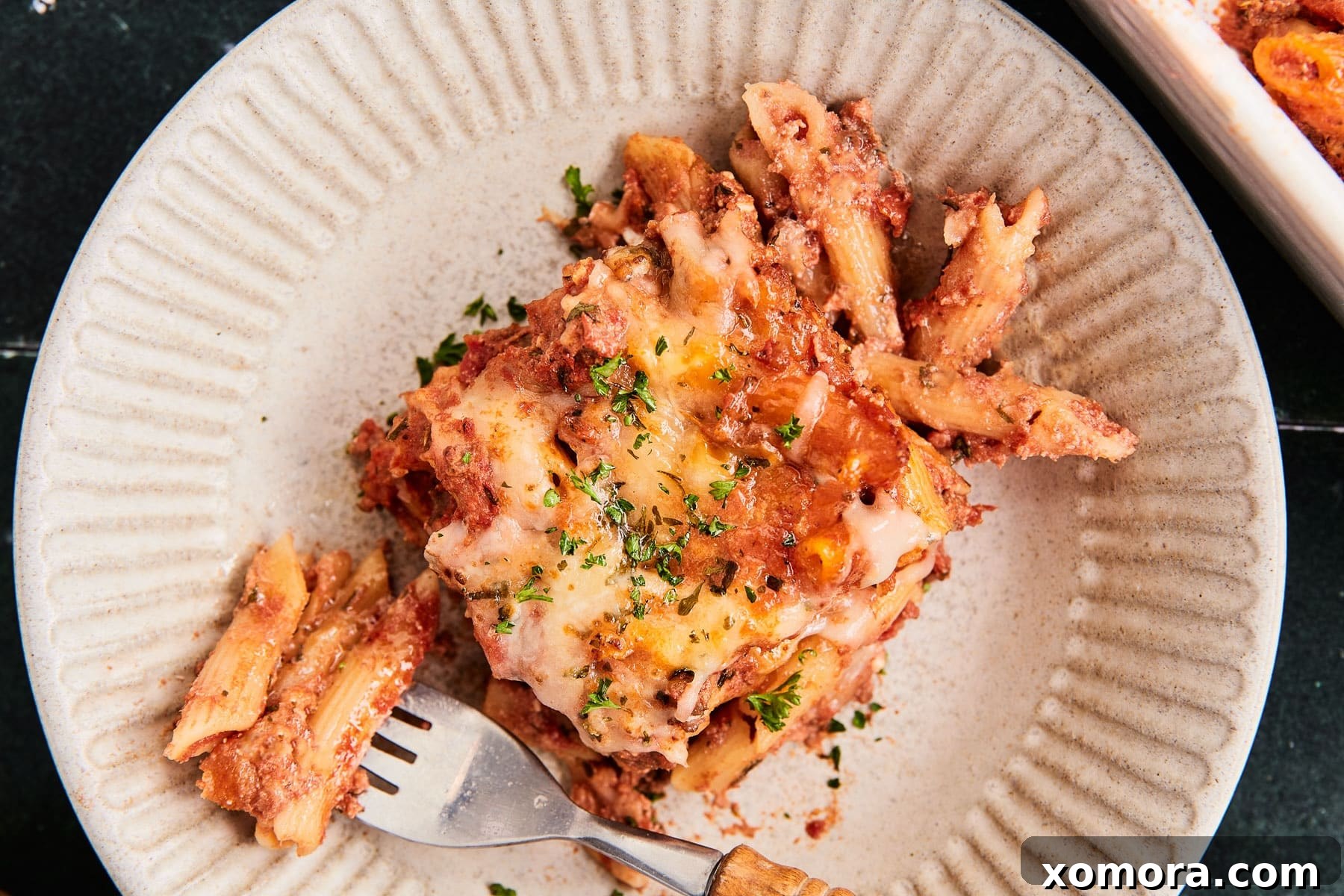A final close-up shot of the Lazy Lasagna Penne Bake, served hot and ready to enjoy.