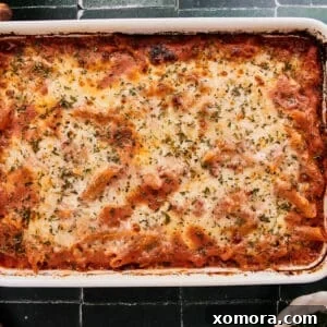 A round image of the finished Lazy Lasagna Penne Bake.