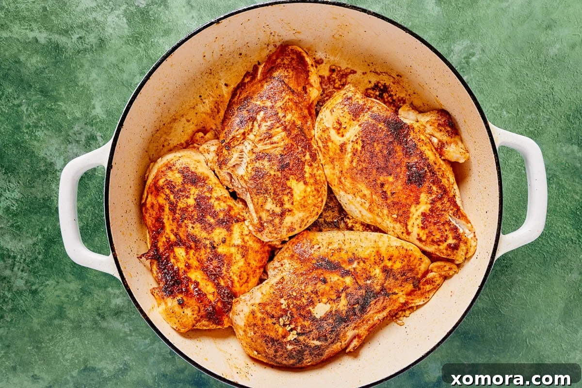 Skillet Chicken with Street-Style Corn and Cilantro Lime Rice 3 Skillet with creamy corn sauce and chicken